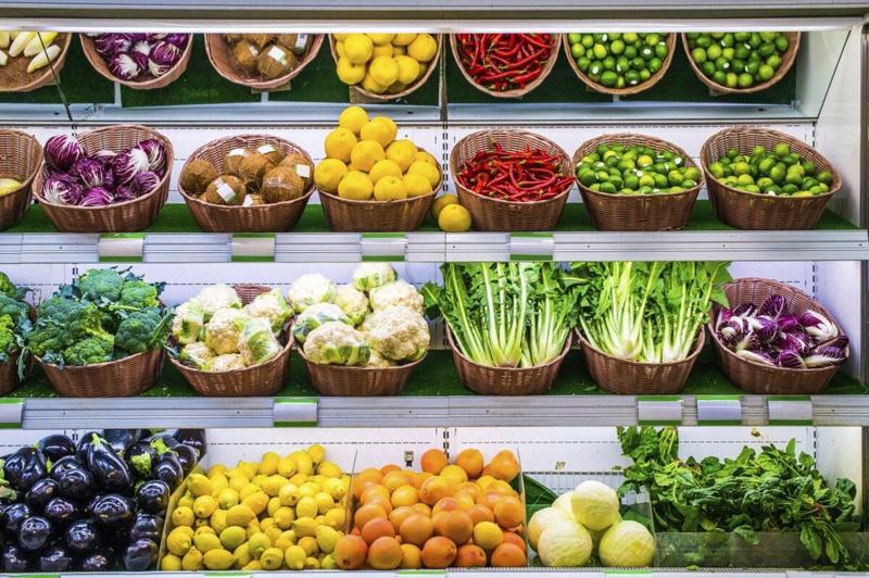 Fruits and vegetables in the produce section of a grocery store.