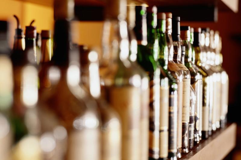 Shelf of liquor bottles (differential focus